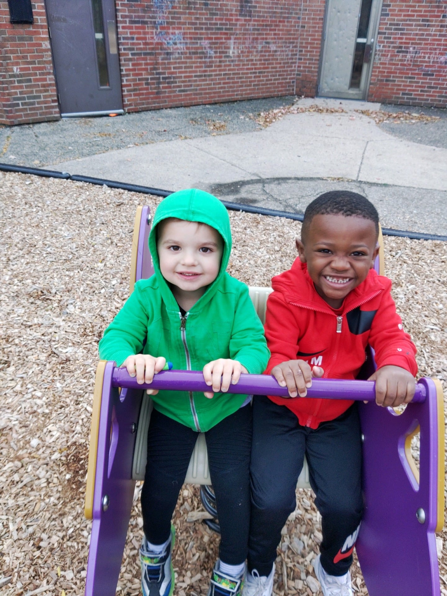 Two preschool children playing at ELC Playground